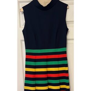 Vintage navy blue dress with green/red/yellow stripes. 100% Dacron polyester.